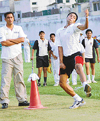 Upcoming speedster V.R.V. Singh during his bowling