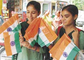 Schoolgirls carry the Tricolour as part of preparations for the Independence Day