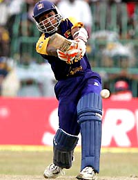 Mahela Jayawardene of Sri Lanka plays a shot during their tri-series final against India in Colombo on Tuesday