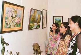 Visitors at an exhibition by students of TAC academy in Ludhiana