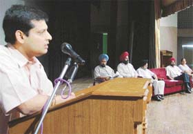 Deputy Commissioner Anurag Verma addresses a meeting of schoolteachers at Guru Nanak Bhavan in Ludhiana