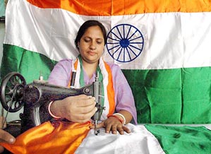 Joy of freedom: Independence Day is only a few days away. However, preparations to celebrate it are in full swing. In the frame a woman stitches Tricolours at Patiala on Tuesday.