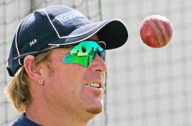 Australias Shane Warne watches the ball during a practice session, ahead of the third Ashes Test against England, at Old Trafford in Manchester on Tuesday