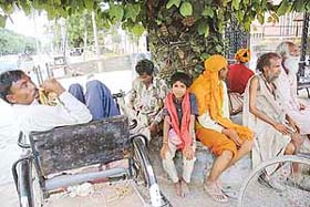 Beggars in front of the Shirdi Temple, Sector 29, Chandigarh