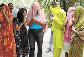 Six call girls allegedly involved in prostitution through a massage parlour/placement services racket, arrested by police on Thursday