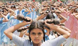 Students rehearse for the Independance Day parade at Government College for Boys in Ludhiana on Friday