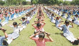 Students rehearse for the Independance Day parade at Government College for Boys in Ludhiana on Friday