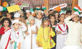Students of Disney Land Nursery School celebrate the Independence Day at the school on Thursday