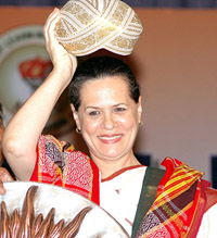 Congress President and UPA Chairperson Sonia Gandhi is welcomed by NSUI members with a traditional cap from Manipur at the NSUI training camp in New Delhi on Thursday