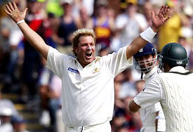 Australias Shane Warne celebrates dismissing Englands Marcus Trescothick to take his 600th Test wicket on the first day of the third Test at Old Trafford in Manchester on Thursday