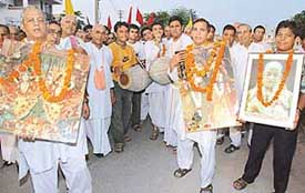 ISKCON devotees take out a nagar sankirtan as part of Janamastmi celebrations in Chandigarh on Saturday