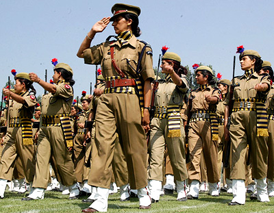 Jammu and Kashmir policewomen march at a full dress rehearsal parade at Bakshi Stadium in Srinagar on Saturday