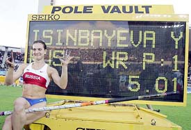 Yelena Isinbayeva of Russia sits near the scoreboard after clearing 5.01 metres to set a new world record during the womens pole vault final at the World Athletics Championships in Helsinki on Friday