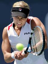 Belgiums Kim Clijsters hits a backhand during her quarterfinal match against Russias Nadia Petrova at the JP Morgan Chase Open in Carson, California