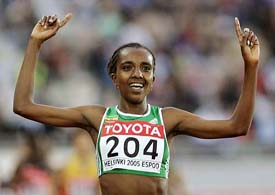 Tirunesh Dibaba of Ethiopia gestures after winning the womens 5,000 metres final at the World Athletics Championships in Helsinki on Saturday