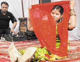 A physically handicapped girl performs at the Independence Day celebration function in Saket High School, Chandi Mandir, Panchkula