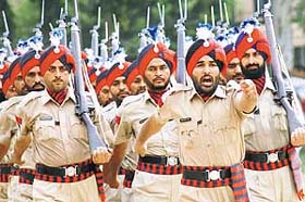 Punjab police personnel march during the Independence Day celebrations at Mohali