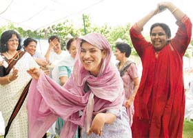 Inmates of Pingalwara at Palsora village dance at a function organised by the Inner Wheel Club of Chandigarh, District 308