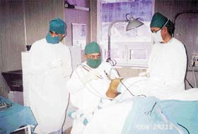 A doctor in the process of orthoscopic ACL reconstruction operation