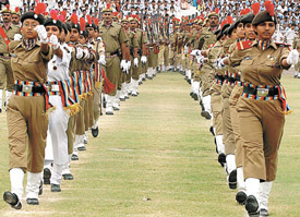 NCC girl cadets participate in a parade during Independence Day celebrations at Chhatrasaal Stadium in the Capital on Monday