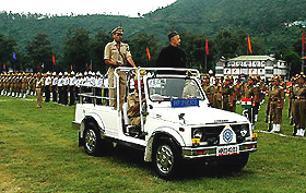 Himachal Pradesh Chief Minister Virbhadra Singh takes the salute at the Independence Day function in Mandi on Monday