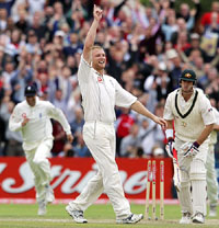 Englands Andrew Flintoff celebrates dismissing Australias Matthew Hayden on the final day of the third Test at Old Trafford in Manchester