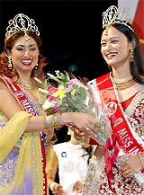 Miss India New York Tashi Sharma is congratulated by outgoing Miss India New York Subrina Dhammi