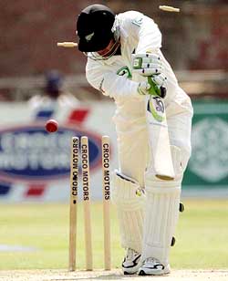 New Zealands Nathan Astle is clean bowled by Zimbabwes Heath Streak on the third day of the second Test in Bulawayo 