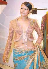 A model showcases fashion designer Sabyasachi Mukherjees pre-Rakhi collection in Kolkata on Wednesday evening.
