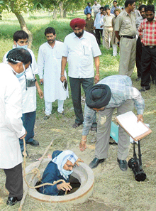 A team of forensic experts in Chandigarh on Thursday at the site where constable Jaswinder Kaur fell in a manhole.