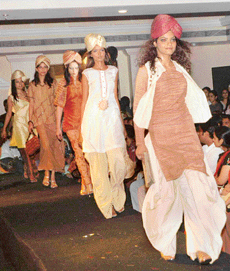 Models sashaying on the stage during the NIFD fashion show.