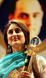 Bollywood star Kareena Kapoor poses after receiving the Rajiv Gandhi Award at a ceremony in Mumbai on Friday