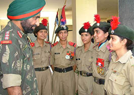 Col D.S. Goraya, Group Commander, 2 Punjab Girls NCC Battalion, along with NCC cadets in Jalandhar on Friday. The cadets have been selected for the National Thal Sainik Camp to be held in New Delhi next month.