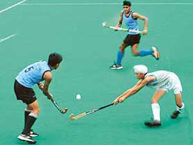 Hockey match in progress between (under-14) Kurali and Amritsar teams at the Sector 42 Stadium, Chandigarh, on Saturday.
