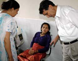 Mr B.C. Rajput, member, Punjab State Human Rights Commission, listens to grievances of a sick woman lying unattended in a Central jail room here. 