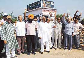 Residents of Kansal village protest against the shifting of a liquor shop in front of their colony at Kaimbwala village in Chandigarh