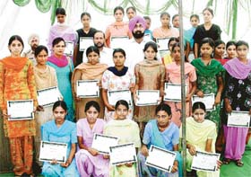 Diploma holders of the Dashmesh Educational Society, who were awarded certificates by Punjab Minister Jagmohan Singh Kang, in Nayagaon village, Mohali
