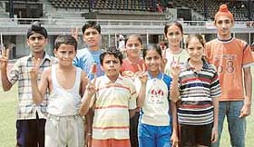 Athletes of Bharatiya Vidya Mandir School, who finished among position holders in the Ludhiana District Athletics Championship, held at Guru Nanak Stadium