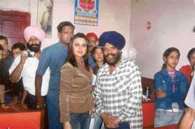 STAR ATTRACTION: Preity Zinta, an ex-Bedian, with Babbi, owner of her college-time haunt, Pappi ka Dhaba, in Shimla.