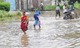 Inundated streets of Industrial Area after rain lashed Ludhiana on Monday. 