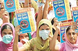Children from various schools and activists of the Guru Gobind Study Circle stage a demonstration outside the office of the Deputy Commissioner, Ludhiana, on Tuesday, seeking implementation of the Tobacco Act.