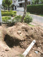 A trench dug up by the BSNL at Phase IV in Mohali on Wednesday.