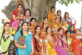 Students of Arya College (Women) celebrate Teej in Ludhiana on Wednesday. 