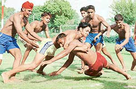 A kabbadi match in progress on the opening day of the two-day Ludhiana District Inter-block Rural Tournament at Guru Nanak Stadium in Ludhiana on Wednesday.