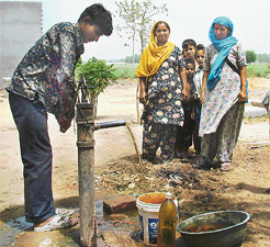 A handpump spews contaminated water in Hamira village near Jalandhar.