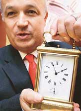 L. Leroy Grand Sonnerie clock is displayed for sale at the Antique and Modern Watch Jewellery Show in Hong Kong on Friday.