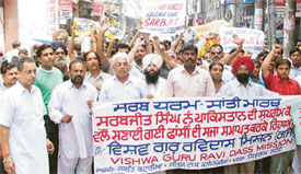 Activists of the Vishwa Guru Ravidass Mission take out a peace march demanding Sarbjits release in Ludhiana on Friday
