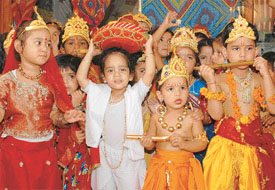 Students of Disney Land perform dance on Janmashtmi on Friday