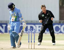 New Zealand bowler Shane Bond celebrates the dismissal of Indian batsman Venugopal Rao during a tri-series match at the Queens Sports Club in Bulawayo on Friday