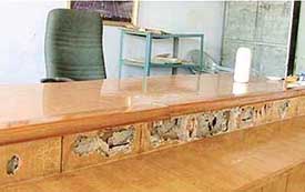 A view of a decayed wooden desk at the ADC’s courtroom in Muktsar.